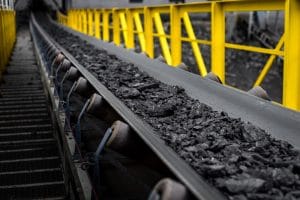 a conveyor transporting coal in a mining application