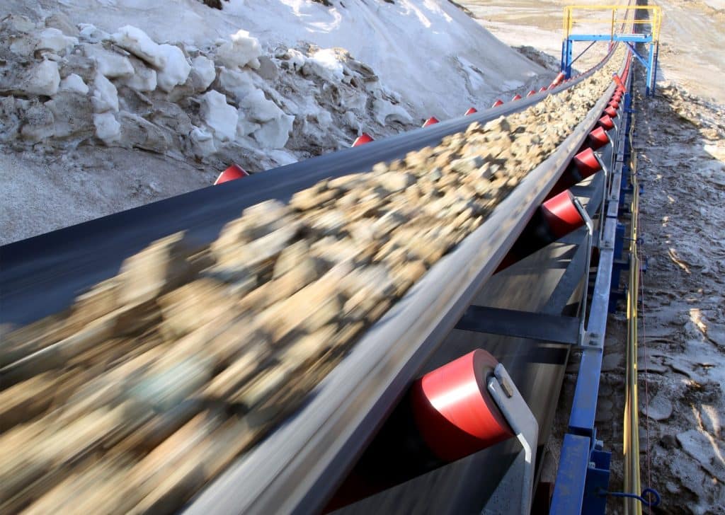 A new conveyor quickly and easily moves ore from a quarry to a processing center.