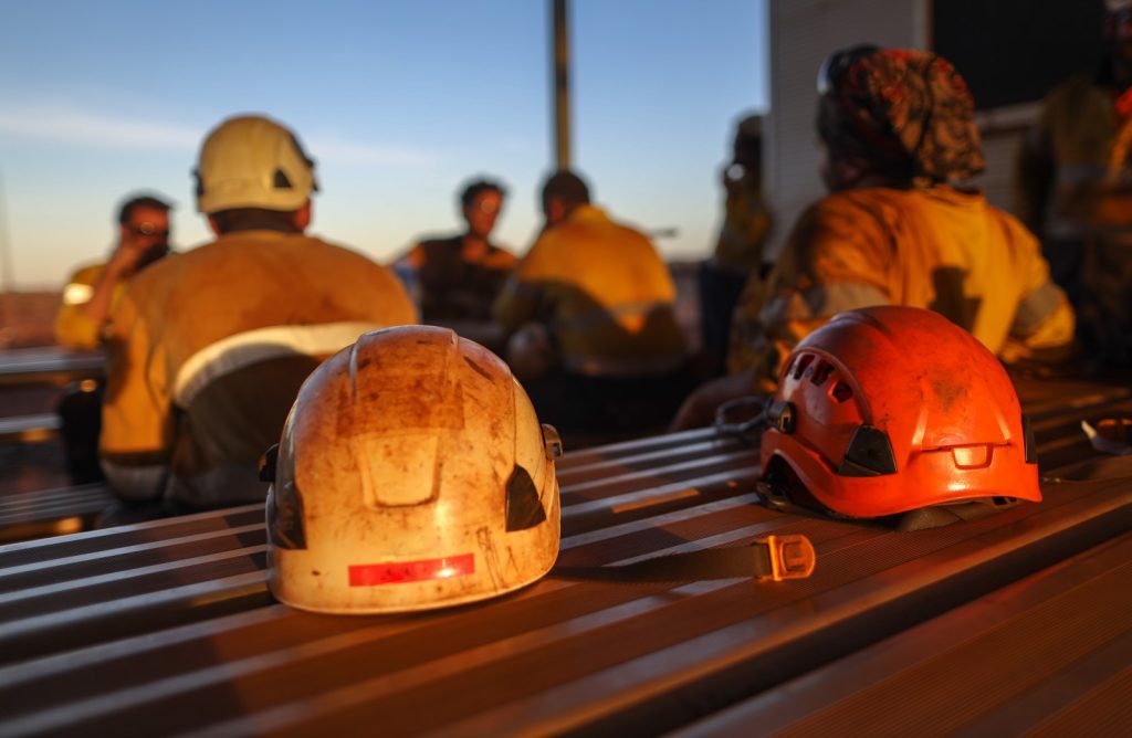 Two PPE underground mining hard hats.