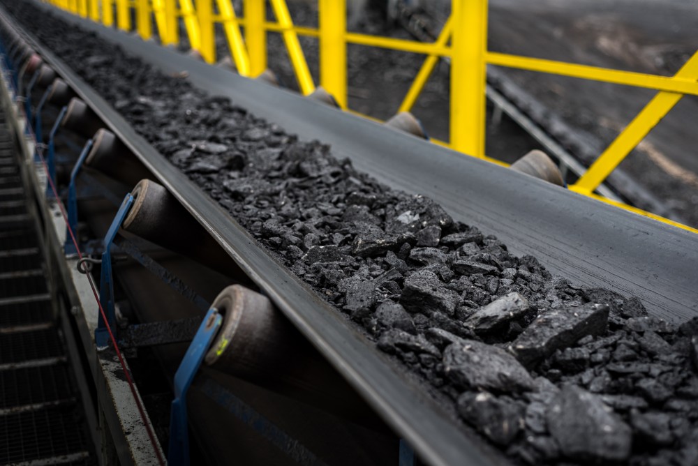 Surface conveyor hauling mining materials